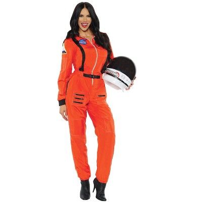 a woman in an orange jumpsuit holding a helmet