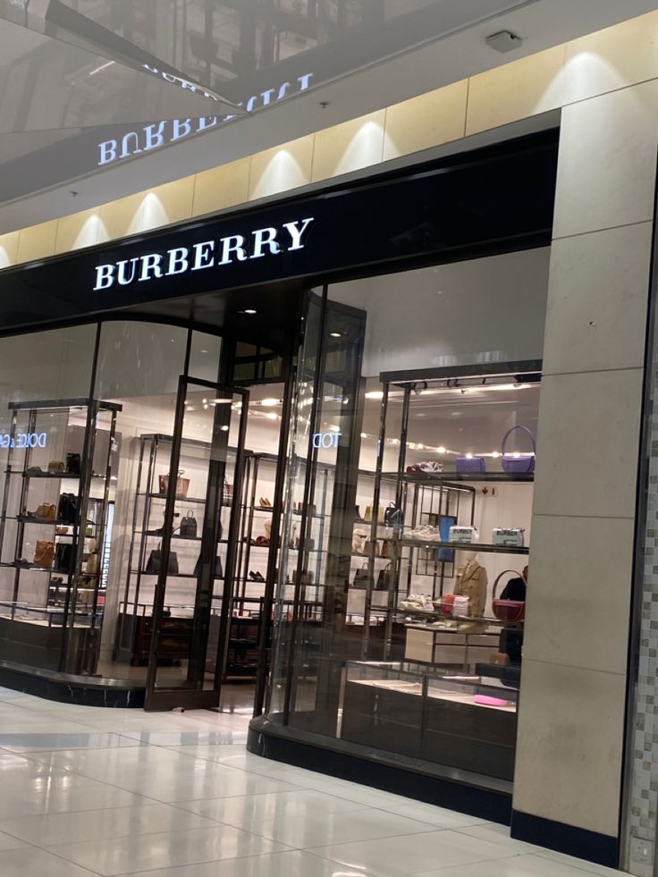 a burberry store front with its lights on