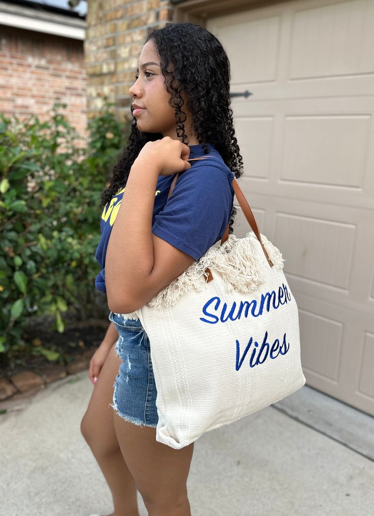 This item is in stock and ready to be shipped. Furthermore, it can also be picked up locally in Magnolia, TX. If you spend more than $99, the shipping costs will be covered by me! This charming fringe detail canvas tote is perfect for embracing the sunny season! Cotton Canvas ToteApproximately 14"W x 17.5"HMagnetic Button Closure Drop Approximately 8" Casual Spring Bags With Fringe, Casual Spring Shoulder Bag With Fringe, Casual Fringe Bags For Spring, Trendy Fringe Shoulder Bag For Summer, Spring Travel Bags With Fringe, Trendy Beach Tote Bag With Tassels, Trendy Tote Beach Bag With Tassels, Trendy Tassel Beach Tote Bag, Summer Fringe Shoulder Bag For Everyday Use