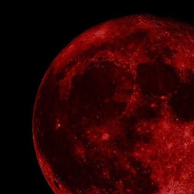 the full red moon is seen in this image