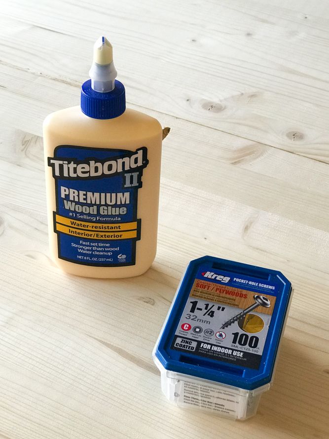 a bottle of titebond premium wood glue next to a tool