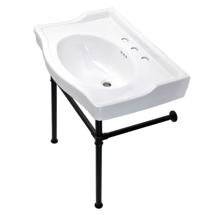 a white sink sitting on top of a metal stand