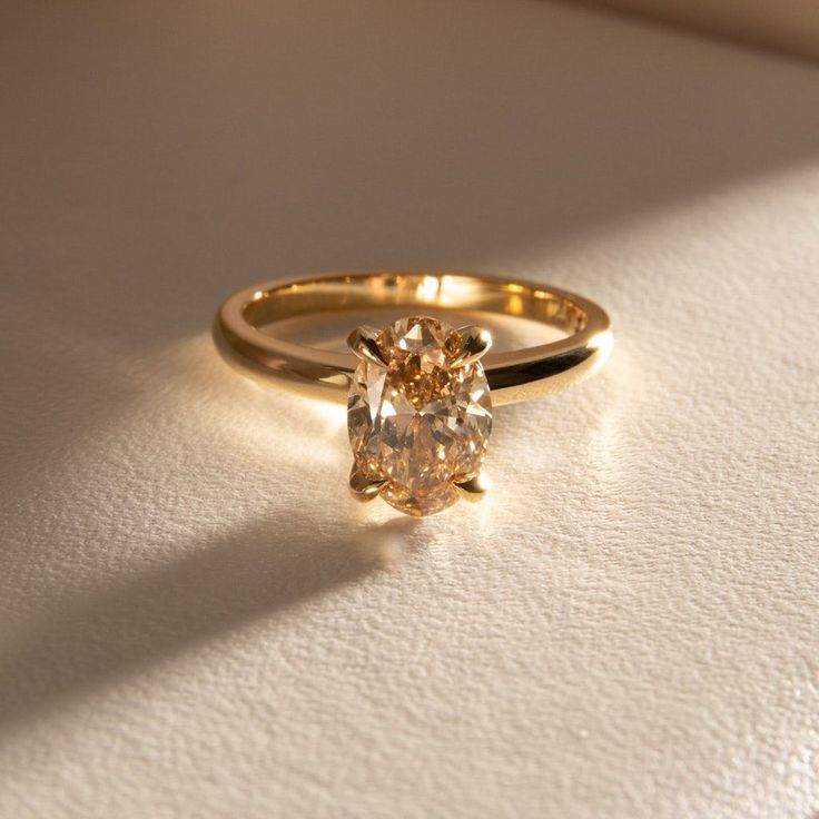 Champagne Diamond Ring Engagement, Champagne Engagement Rings, Brown Engagement Rings, Naveya And Sloane, Champagne Diamonds Engagement, Champagne Ring, Engagement Ring Designs, Oval Diamond Solitaire, Solitaire Engagement Rings