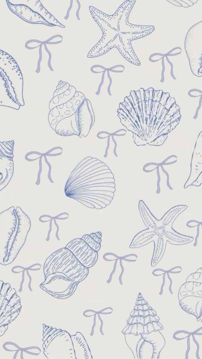 a blue and white wallpaper with seashells on the bottom right hand corner