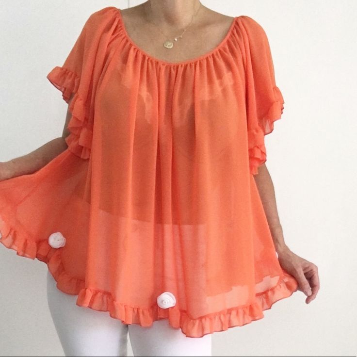 Basically Me, The Modern Bohemian Collection From Fashion Designer, Sonia Youmans, Marries The Gypsy Spirit With Luxe Bohemian Sensibilities For Today’s Fashion Conscious Woman. Whether Feeling Flirty, Or Casual, Or Sexy And Sleek, Basically Me Is Basically You. Solid Color Bohemian Blouse For Vacation, Orange Short Sleeve Blouse With Ruffles, Orange Ruffled Short Sleeve Blouse, Orange Ruffled Tops For Vacation, Orange Ruffled Top For The Beach, Orange Ruffled Top For Beach, Flowy Short Sleeve Peasant Top For Vacation, Flowy Orange Blouse For Summer, Flowy Orange Summer Blouse