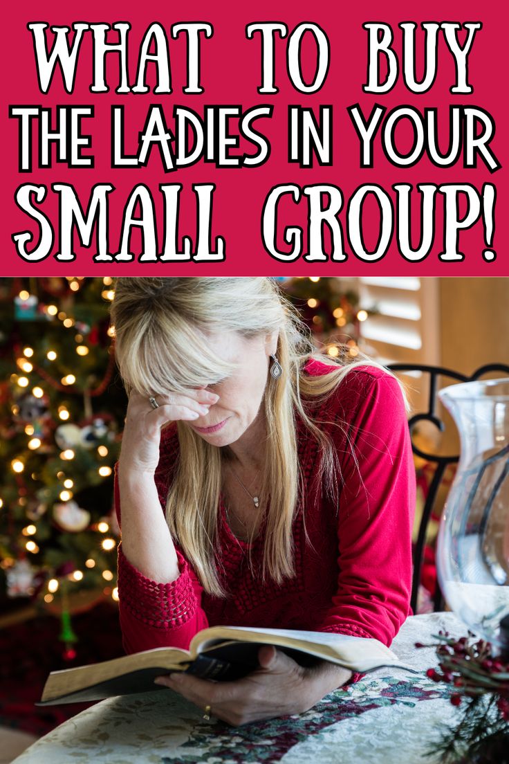 a woman sitting at a table reading a book with the words what to buy the ladies in your small group