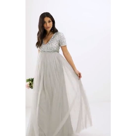 Wow in this beautiful v-neck, maxi dress. Sequins on top with a dreamy tulle bottom in a soft gray color Rent for $69Retails for $150 Chic Gray V-neck Maxi Dress, Elegant Flowy Tulle Maxi Dress, Gray Formal Maxi Dress, Chic Maxi Dress With Tulle Skirt, Tulle Maxi Dress For Bridesmaids, Gray Spring Bridesmaid Dress, Spring Gray Bridesmaid Dress, Prom Maxi Dress With Tulle Skirt, Elegant Spring Tulle Maxi Dress