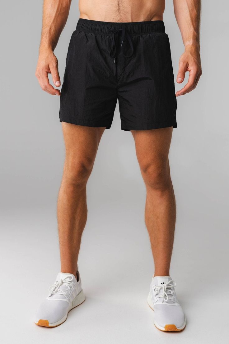 Our React Run Short is the perfect sporty short for any activity. This short has a built in liner short for maximum coverage, comfort, & versatility. Sporty Black Swimwear With Built-in Shorts, Nylon Swim Trunks With Built-in Shorts, Sporty Swim Trunks With Built-in Shorts, Sports Swim Trunks With Built-in Shorts, Solid Swim Trunks With Built-in Shorts For Sports, Relaxed Fit Swim Trunks With Built-in Shorts For Sports, Solid Color Nylon Shorts With Functional Drawstring, Sporty Breathable Swimwear For Training, Casual Sports Swimwear With Built-in Shorts