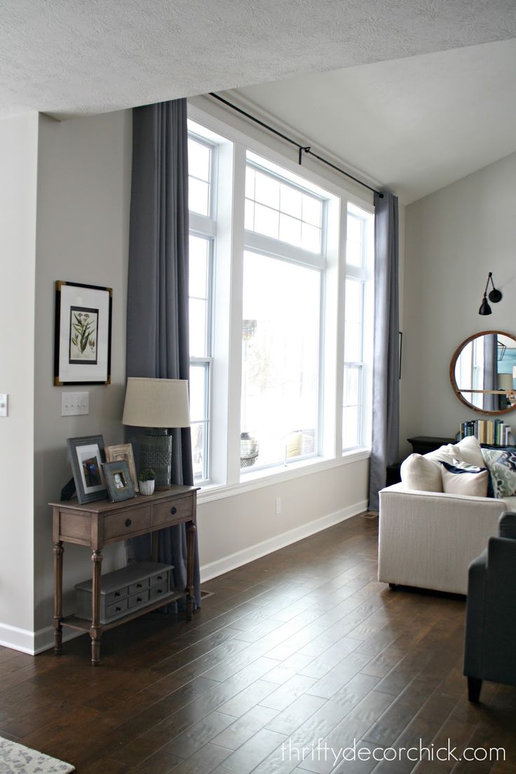 the living room is clean and ready to be used as an office or family room