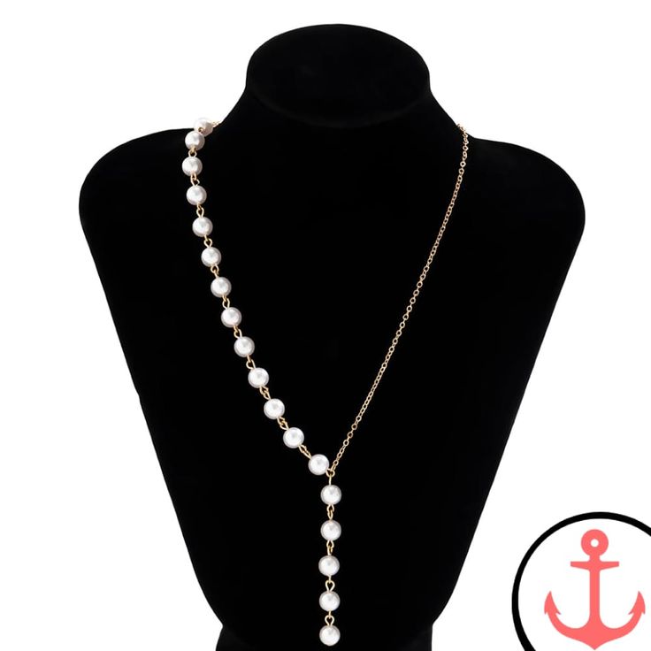 Discover the Allure of the Gold Pearl Beach Necklace Indulge your love for the sea with our exquisite Gold Pearl Beach Necklace. Exuding elegance and charm, this piece is designed for passionate sea lovers like you. Crafted with meticulous attention to detail, it showcases the beauty of nautical symbols, making it a perfect addition to your collection. As part of our Beach Necklaces collection, the Gold Pearl Beach Necklace embodies the essence of coastal living. Its timeless design draws inspir Elegant Silver Necklace For Beach, Elegant Metal Jewelry For Beach, Gold Alloy Beach Jewelry, Pearl Pendant Necklaces For Beach, Gold Alloy Jewelry For Beach, Elegant Beach Jewelry Made Of Alloy, Beach Pendant Jewelry With Clavicle Chain, Elegant Beach Charm Necklaces With Pearl, Elegant Dangle Jewelry For Beach