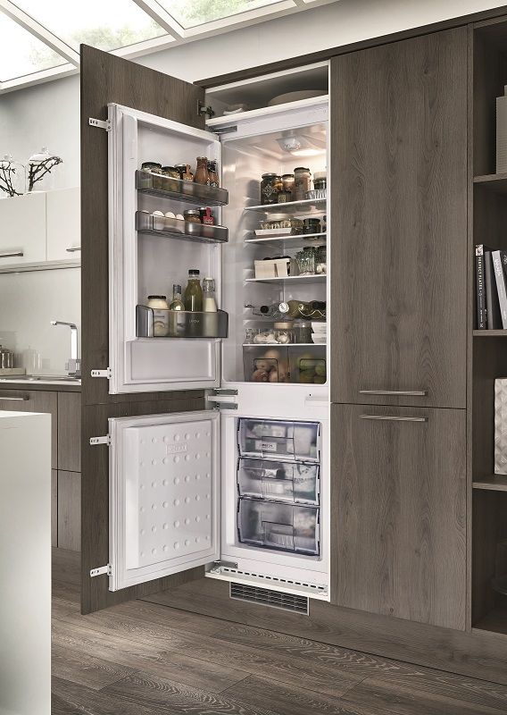 an open refrigerator with its door wide open