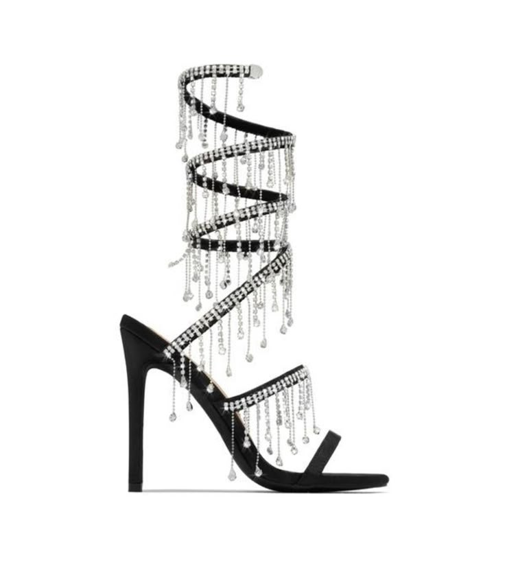 Step up your style game with the High End sandal, a luxurious and sophisticated design in black. The ankle strap and dangle detailing, inspired by the world of art and fashion, create an eye-catching statement that adds a touch of glamour to any outfit. Perfect for special occasions or a night out, these premium sandals are sure to elevate your look. True to Size for Most Embellished Around the Ankle Strap Dangle Detailing Heel Hight: 4.25” (approx) Hoco Ideas, Gold Stilettos, Short Acrylic, Head Color, Stunning Shoes, Birthday Planning, Party Girl, Prom Outfits, Stiletto Sandals