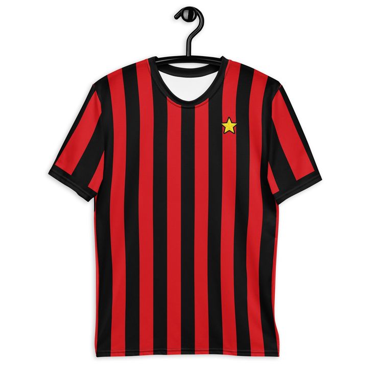 Inspired by the iconic 1982-83 AC Milan home shirt design. Get to know your new favorite tee - it's super smooth, super comfortable, and made from a cotton touch polyester jersey that won't fade after washing.  * 95% polyester, 5% elastane (fabric composition may vary by 1%) * Premium knit mid-weight jersey * Four-way stretch fabric that stretches and recovers on the cross and lengthwise grains * Regular fit * Blank product components in the US and Mexico sourced from the US * Blank product components in the EU sourced from Lithuania Black Jersey Tops With Three Stripes, Black Jersey Top With Three Stripes, Fan Merchandise Short Sleeve Jersey With Letter Print, Short Sleeve Jersey With Graphic Print For Fans, Graphic Print Short Sleeve Jersey For Fan Gear, Short Sleeve Jersey With Letter Print For Fans, Fan Merchandise Short Sleeve Jersey, Crew Neck Jersey For Fan Merchandise, Crew Neck Cotton Jersey With Team Logo