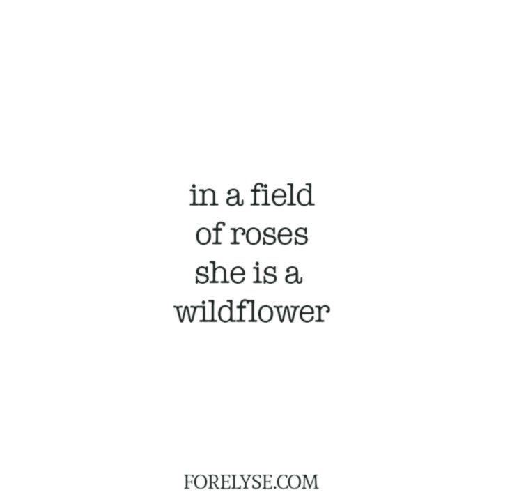 the words in a field of roses she is a wildflower are written on a white background