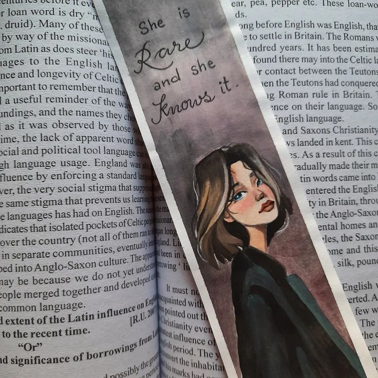 a bookmark with an image of a woman's face on it and the words she is brave and she knows it