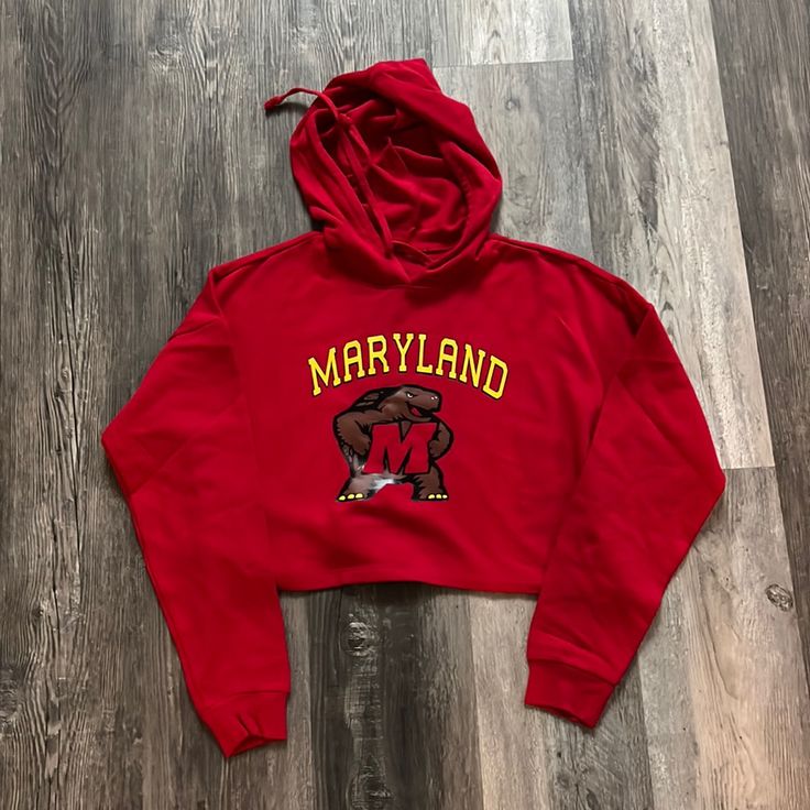 New With Tags. Red. Size Small. Red Fan Apparel Hoodie, Trendy Red Cotton Sweatshirt, Red Cotton Hoodie For Fall, Red Game Day Fan Apparel Hoodie, Hooded Tops For Game Day In Winter, Red Winter Fan Gear Tops, Red Cotton Hoodie With Adjustable Hood, Hooded Winter Tops For Game Day, Red Fan Apparel Hoodie Sweatshirt