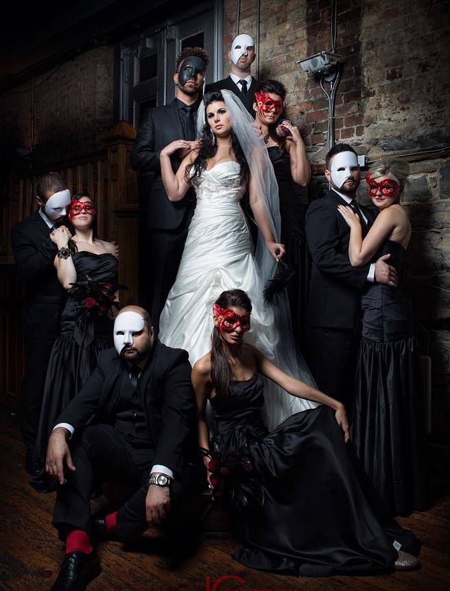 a group of people dressed up as brides and grooms posing for a photo