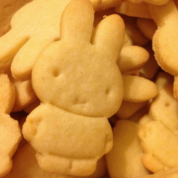 a pile of cookies shaped like cartoon characters