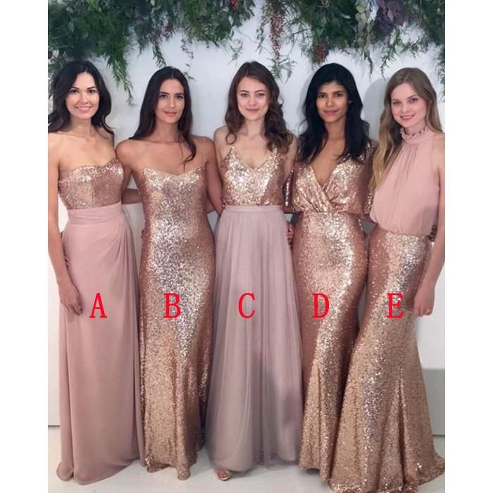 the bridesmaids are posing for a photo in their pink dresses and gold sequins