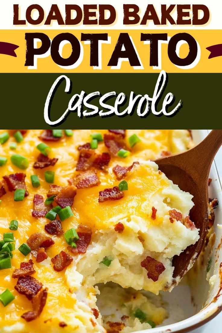 loaded baked potato casserole with bacon and green onions in a white dish on a wooden spoon