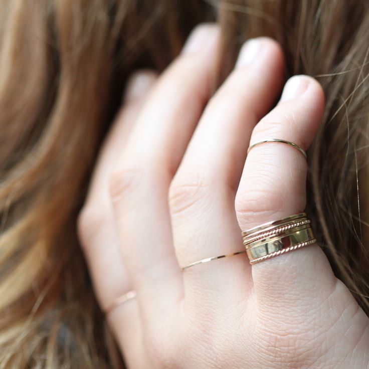 Hand-twisted stackers that look great on any finger. Add a beautiful bit of simple sparkle to your everyday look! Made in our Brooklyn studio with 100% recycled solid 14k gold. Adjustable Elegant Wide Band Ring, Elegant 14k Gold Bands With Metal Ring, Timeless Double Band Ring Jewelry, Timeless Double Band Ring With Detail, Fine Jewelry Open Band Rings With Ring Detail, Fine Jewelry Rings With Open Band Detail, Stackable Thick Band Rings Fine Jewelry, Adjustable 14k Stamped Rings For Everyday, Adjustable Everyday Rings Stamped 14k