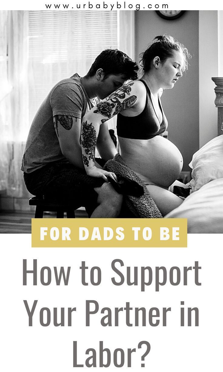 a man and woman sitting in bed with the text for dads to be how to support your partner in labor?