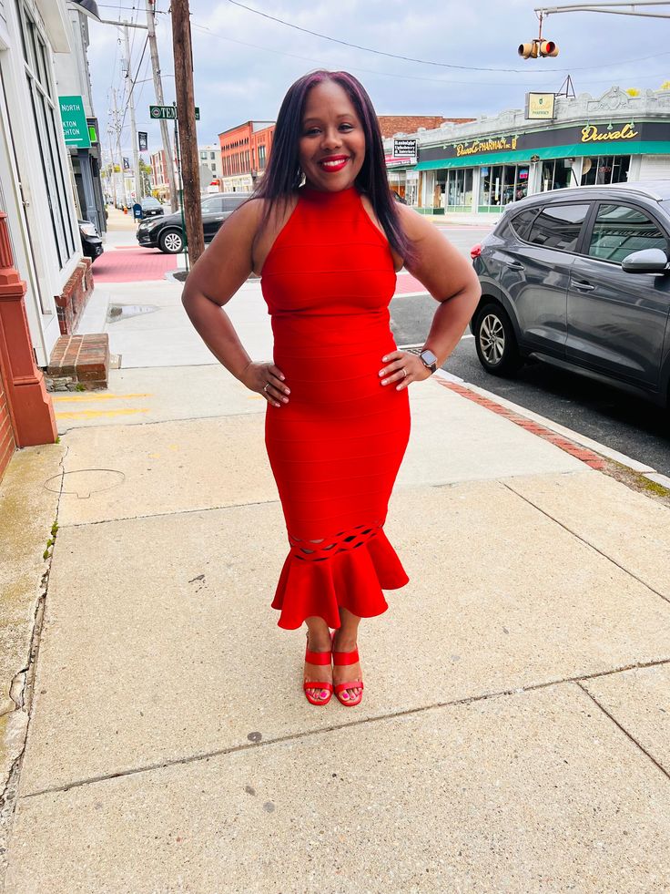 This sleek red bandage dress is all the fire you need at your next event! It features a halter mock neck, trumpet hem, and zip closure. Color: Red Fabric: