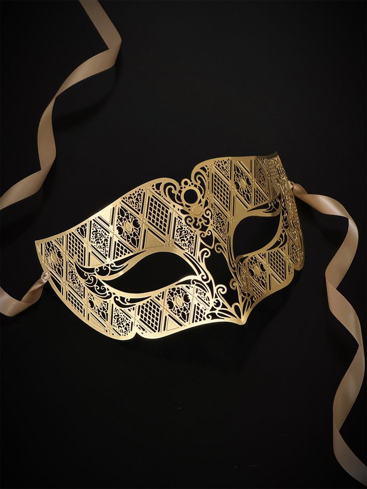 Our laser-cut metal mask boasts a stunning gold finish that shines and shimmers, ensuring you stand out in any crowd. Crafted with your comfort in mind, our mask is lightweight and easy to wear for hours on end.


Age Group/Gender - Adult/Men

Size/Type - One size fits all adults

Mask Color - Gold

Mask Material - Laser cut metal Gold Full Face Masquerade Mask For Carnival, Full Face Gold Masquerade Mask For Carnival, Gold Masks For Evening Carnival, Gold Carnival Masks For Evening, Gold Eye Masquerade Mask, Gold Carnival Masquerade Eye Mask, Gold Eye Mask As Gift, Gold Eye Mask Gift, Gold Eye Mask For Gift