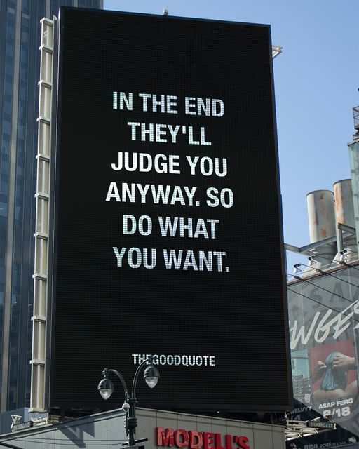 an advertisement on the side of a building that says in the end they'll judge you anyway so do what you want