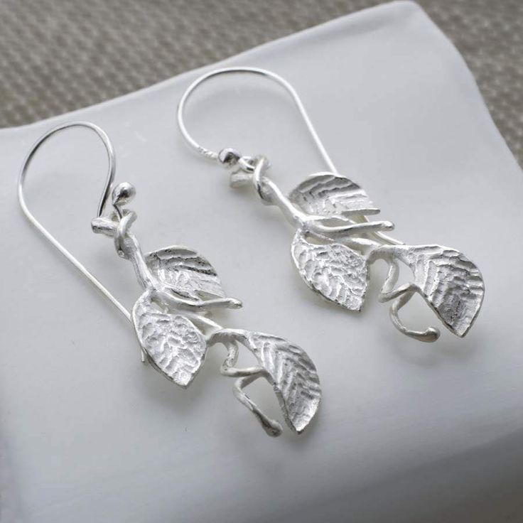 • Sterling silver dangly earrings • Sterling silver ear wire hooks • Made from recycled sterling silver Leaf Jewellery, Bubble Earrings, Leaves Earrings, Everyday Jewellery, Silver Leaves, Silver Jewellery Sets, Leaf Jewelry, Triangle Earrings, Dangly Earrings