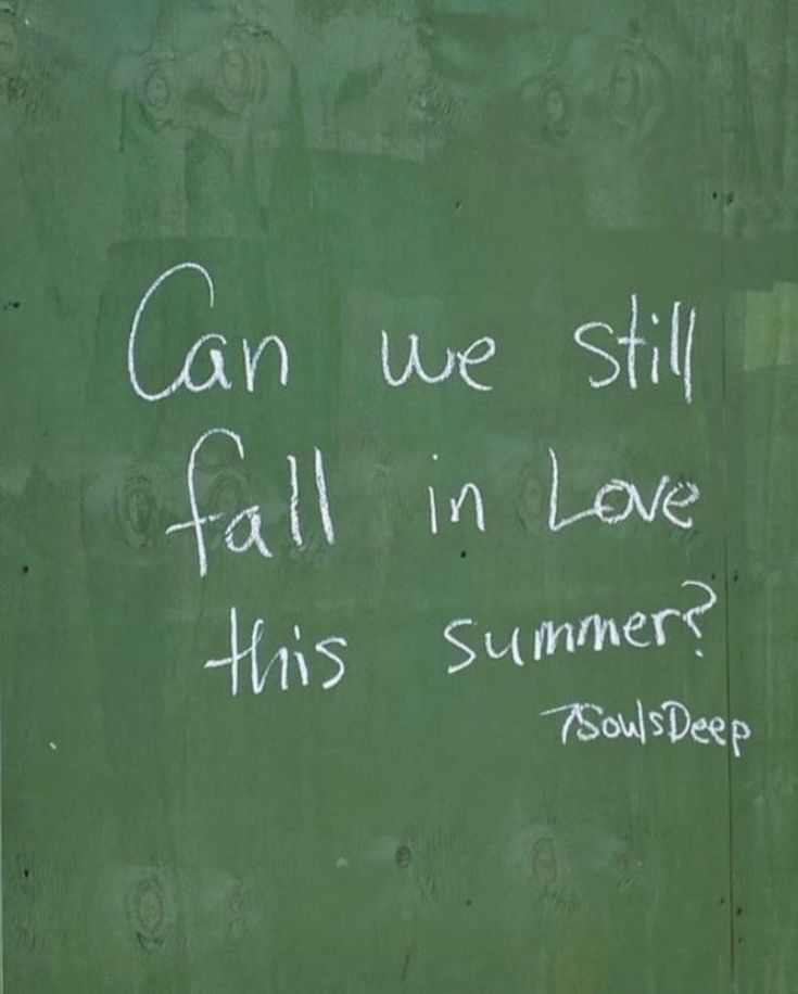 graffiti written on the side of a green wall that says can we still fall in love this summer?