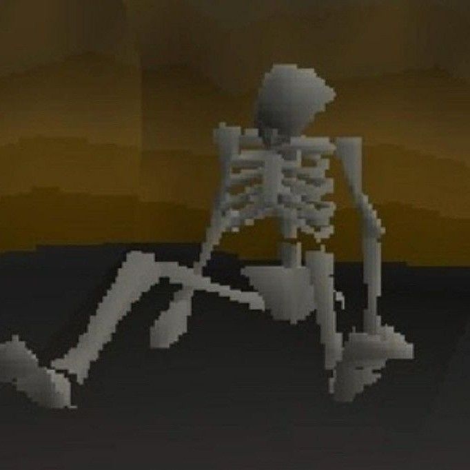 the skeleton is sitting in front of a computer screen with an arrow pointing to it