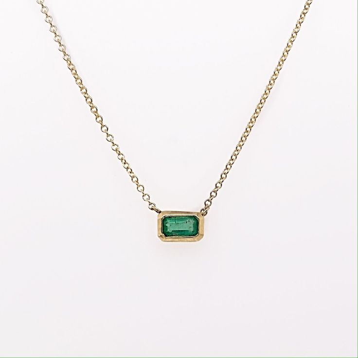 Yellow Gold Emerald-cut Necklace With Bezel Setting, Yellow Gold Necklace With Emerald Cut Bezel Setting, Yellow Gold Emerald Cut Necklace With Bezel Setting, Classic Emerald Necklaces With Bezel Setting, Classic Emerald Necklace With Bezel Setting, Fine Emerald Necklaces With Bezel Setting, Elegant Oval Emerald Necklace With Bezel Setting, Fine Jewelry Necklace With Smooth Bezel, Elegant Emerald Pendant Necklace With Bezel Setting