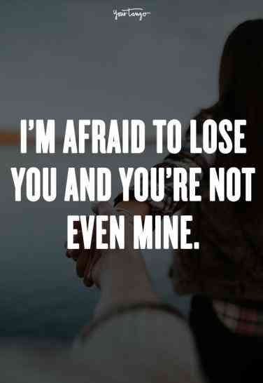 a woman holding her hand up to the sky with text saying i'm afraid to lose you and you're not even mine