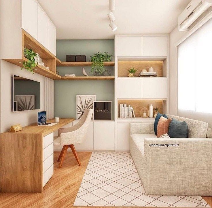 a living room filled with furniture and lots of shelves