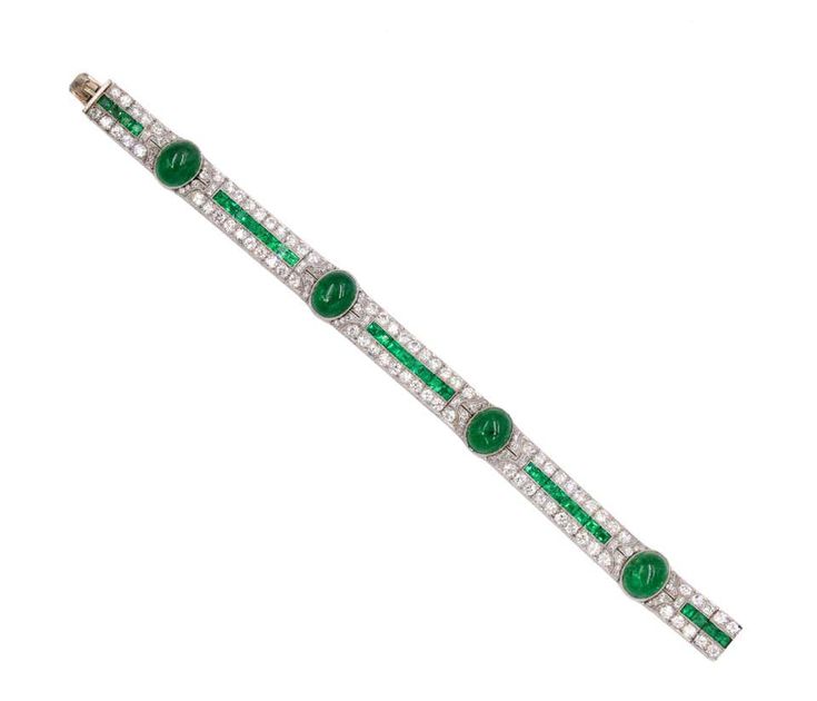 For Sale on 1stDibs - Art Deco Emerald and Diamond Bracelet. This bracelet has cabochon and square- cut emeralds, old and single-cut diamonds all set in platinum, Length 6.875 Formal Emerald Gemstone Bracelets, Formal White Gold Diamond Bracelet With Emerald, Emerald Diamond Bracelet In White Gold For Formal Events, Elegant Green Cabochon Bracelets, Formal Green Cabochon Bracelets, Formal Green Cabochon Bracelet, Green Cabochon Bracelet For Formal Occasions, Green Cabochon Bracelets For Formal Occasions, Luxury Green Rectangular Bracelets