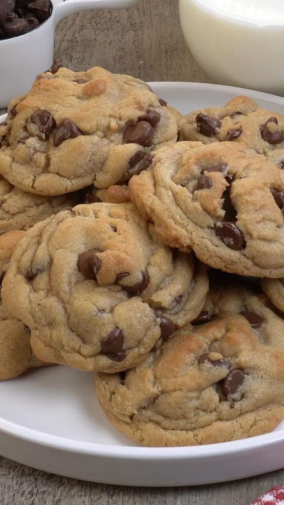 chocolate chip cookies and milk on a plate