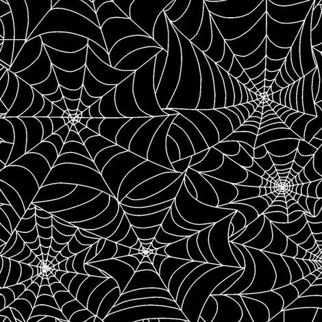 two black and white spider webs are on the same wallpaper, one is an abstract