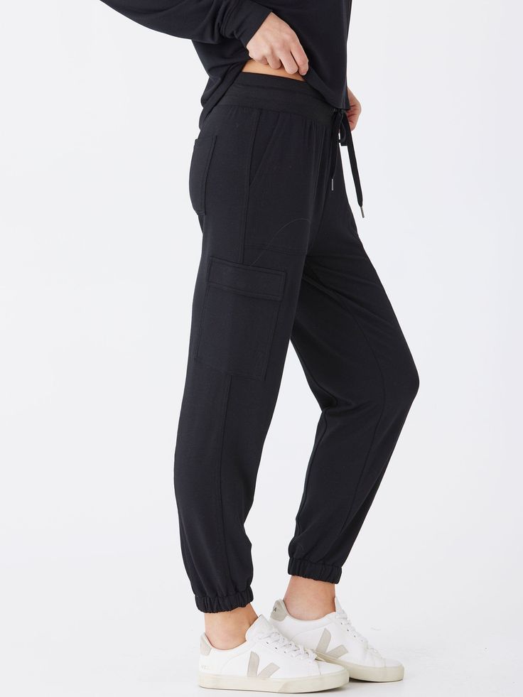 Indulge in ultimate comfort with Margot Modal Terry Cargo Jogger. Featuring a soft, wide elastic waistband for all-day comfort, and convenient cargo pockets for added functionality. Elevate your loungewear game with these joggers and experience a new level of relaxation. Utility Relaxed Fit Joggers For Loungewear, Comfortable Yoga Pants With Pockets For Sports, Utility Joggers With Side Pockets For Loungewear, Comfortable Cargo Pants With Side Pockets, Athleisure Joggers With Pockets For Loungewear, Comfortable Long Joggers With Side Pockets, Relaxed Fit Cargo Pants With Side Pockets For Sports, Stretch Sweatpants With Cargo Pockets For Loungewear, Athleisure Cargo Pants With Pockets For Loungewear