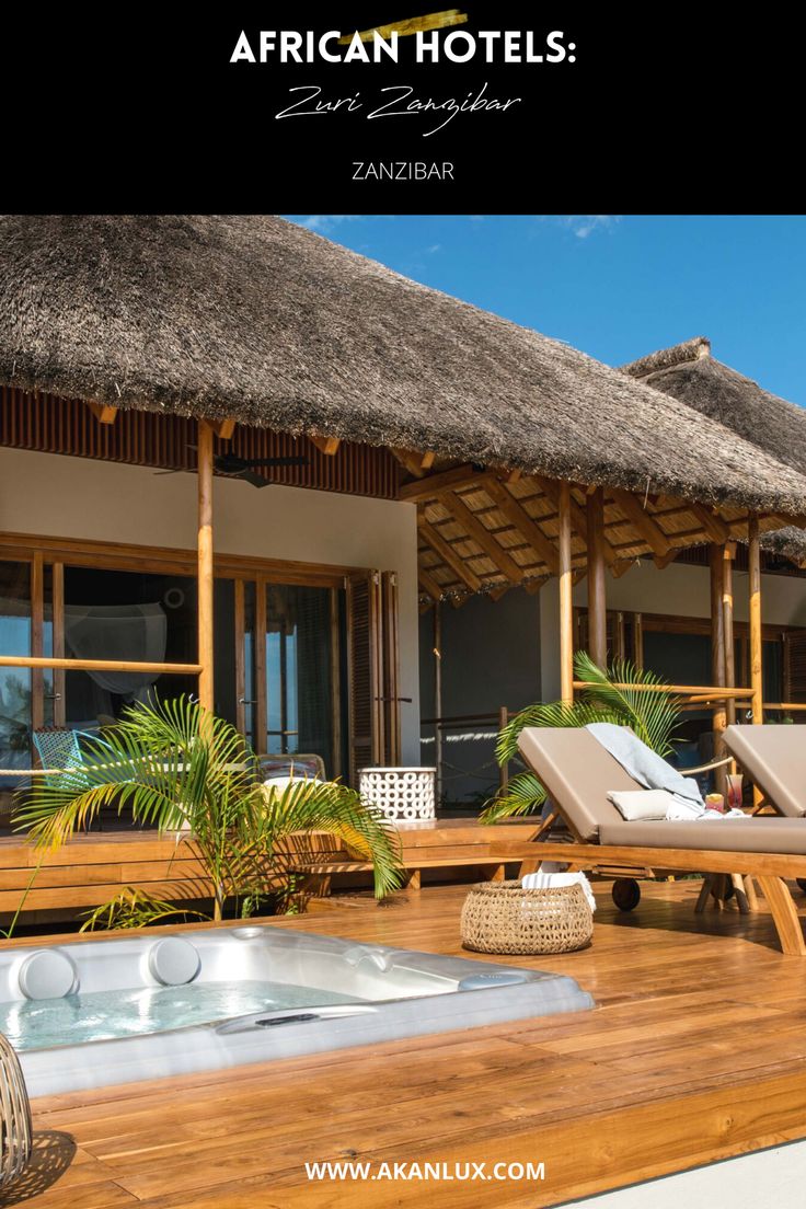 an outdoor hot tub next to a deck with chaise lounge chairs and palm trees