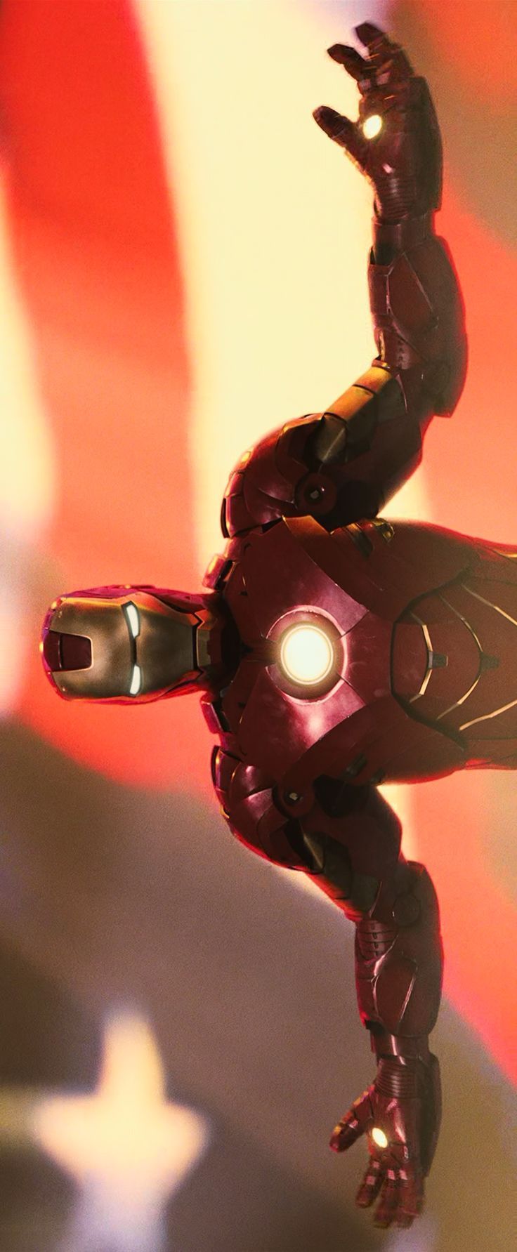 an iron man action figure is shown in front of a red and white background with stars