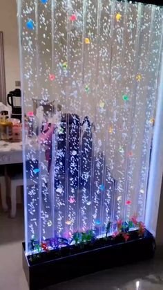 a large display case filled with lots of bubbles and stars on the side of it