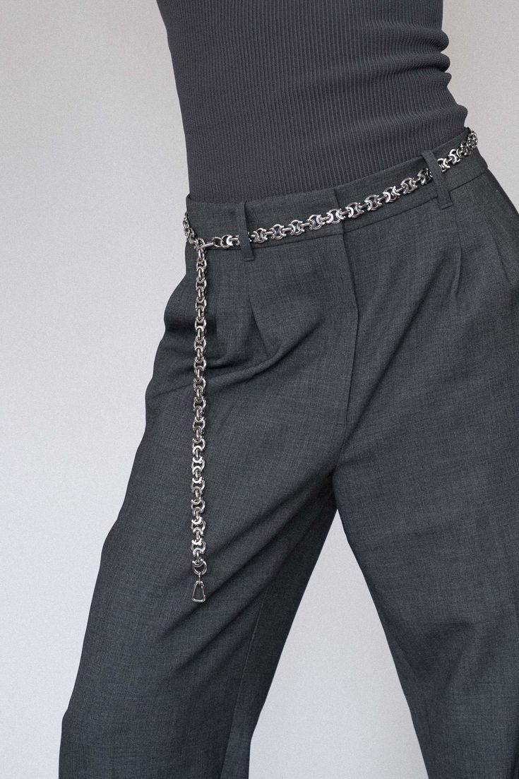 Refined and versatile, the Eris Silver Chain Belt is a statement piece that reflects Lapo Lounge's commitment to timeless design. Made from durable stainless steel, this belt showcases a minimalist yet striking chain-link pattern. Wear it to cinch your waist, pair it with trousers or style it as a necklace for a fresh, fashion-forward approach to accessorizing. Whether you're dressing up or down, the Eris is designed to enhance any ensemble with a touch of modern luxury. The chain is completely Silver Chain Belt, Pant Chains, Hair Charms, Streetwear Inspo, Fresh Fashion, Chain Belts, Silver Belts, Fit Details, A Necklace