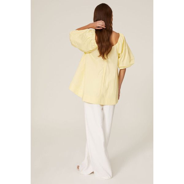 Yellow cotton (77% Cotton, 23% Nylon). Top. Short sleeves. V-neckline. 25.5" from shoulder to hemline. Imported. Cotton V-neck Puff Sleeve Top For Work, Casual V-neck Cotton Puff Sleeve Top, Casual V-neck Puff Sleeve Top For Daywear, Fitted Cotton V-neck Top For Spring, Summer V-neck Puff Sleeve Top For Daywear, Cotton V-neck Top For Spring Day Out, Cotton Off-shoulder Blouse For Daywear, Yellow Cotton V-neck Blouse, Spring Cotton Puff Sleeve Top For Workwear