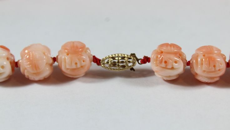 "-Vintage 14k Chinese Carved Symbol \"Shou寿\" Natural Angel Skin Coral Necklace 64.4 g -Total length: 18.25 in -Total weight: 64.4 g -Bead size: about 10.65 mm -Clasp is marked 14k & JCM -In excellent condition, only few hairline cracks" Carved Yellow Gold Round Necklace, Luxury Carved Yellow Gold Necklaces, Traditional Carved Necklaces For Formal Occasions, Formal Carved Round Necklace, Formal Round Carved Necklace, Antique Carved Yellow Gold Necklaces, Vintage Carved Round Necklaces, Antique Carved Round Necklace, Antique Carved Necklaces For Formal Occasions