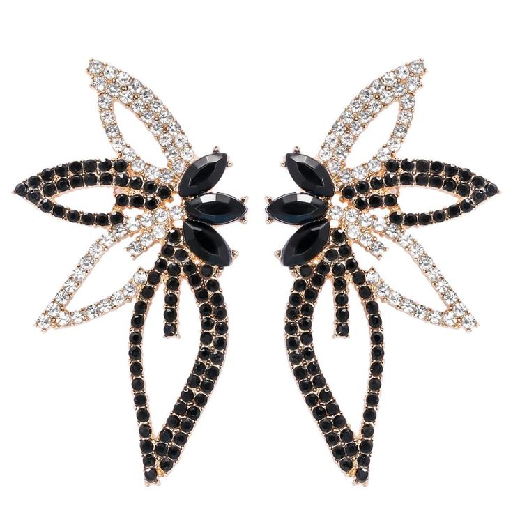 pair of black and white earrings with crystal stones on each earring, set in 18k gold plated setting