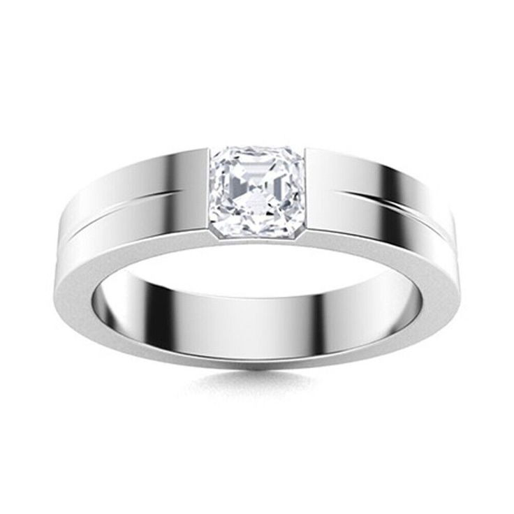 a white gold ring with a princess cut diamond