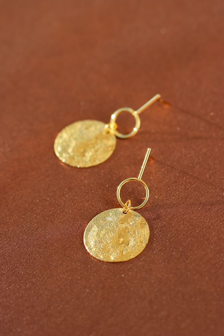 Made from gold-plated on brass. 18k gold plated posts. Hypoallergenic. Tarnish resistant. Made to order. Gold Plated Single Earring In Circle Shape, Single Circle Gold-plated Earring, 14k Gold-filled Jewelry, Gold Circle Earrings In Sterling Silver, Gold Sterling Silver Circle Earrings, 14k Gold Circular Jewelry, Hammered Gold-plated Drop Earrings, Gold Tarnish Resistant Earrings In 14k Gold Filled, Tarnish Resistant Yellow Gold Circle Earrings