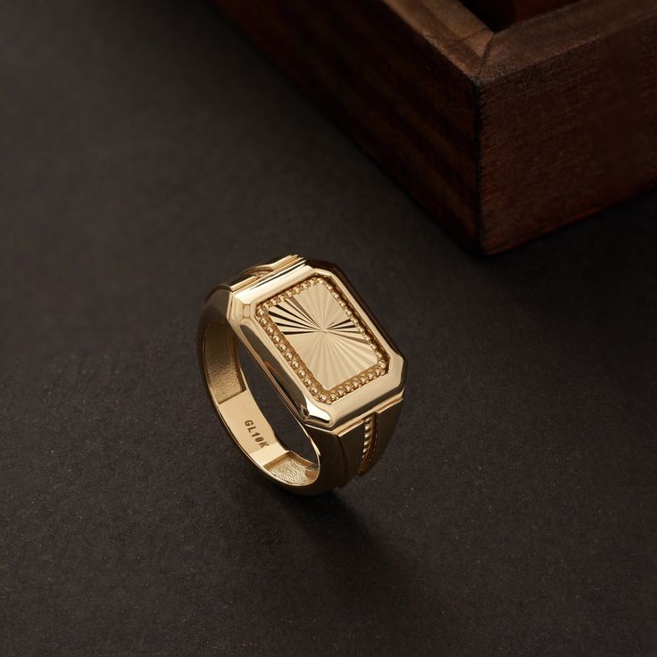 Elevate your style with our 14K Solid Gold Engraved Signet Ring for Men. This handcrafted ring, made from genuine 14K solid gold, is customizable with engravings, making it the perfect gift for husbands and boyfriends. The square signet design adds a touch of classic sophistication, making it a timeless piece of men's jewelry. Celebrate special moments and express your emotions with this exquisite ring, reflecting your unique bond and individual style. -- ⋆ This product is designed with Runda's fine handcrafting with sustainable methods. ⋆ Express-insured shipping to the whole world and delivery to cargo in only 3 business days. ⋆ Free return and warranty Product Details * 14K Real Solid Gold * 6.75 GR 5% -+ * Customizable Size * Yellow - White - Rose Gold Available * Hypoallergenic * Mode Unique Ring Designs For Men, Man Gold Ring Design, Gents Gold Ring Indian, Gold Rings For Men Indian Wedding, Men’s Pinky Ring, Mens Signet Wedding Ring, Men Gold Ring Design Unique, Gold Rings For Men Unique, Boys Rings Design Gold