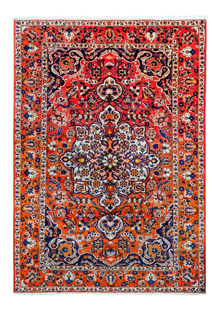 an orange, blue and red rug with floral designs